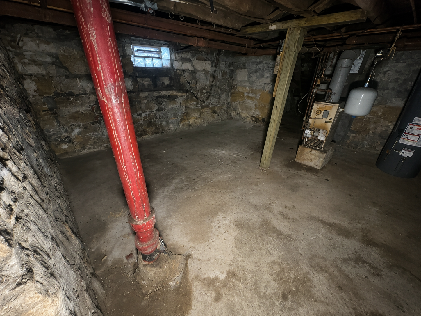 Basement after cleanout — empty and cleared by Turnkey Trashouts